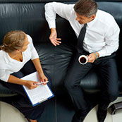 Man and woman discussing e-training