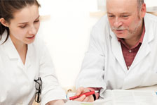 Male and female doctor e-training
