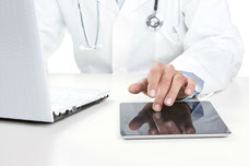 Medical professional e-training using a tablet.